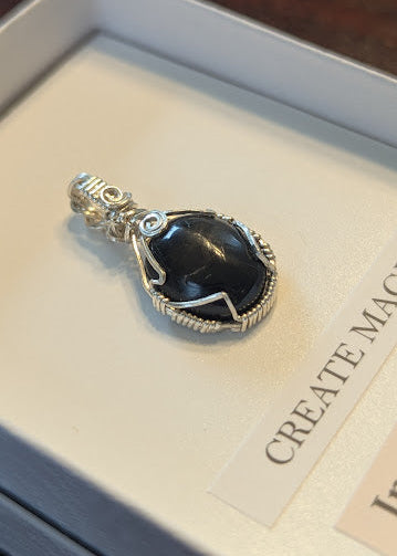 Black Star Diopside Pendant
